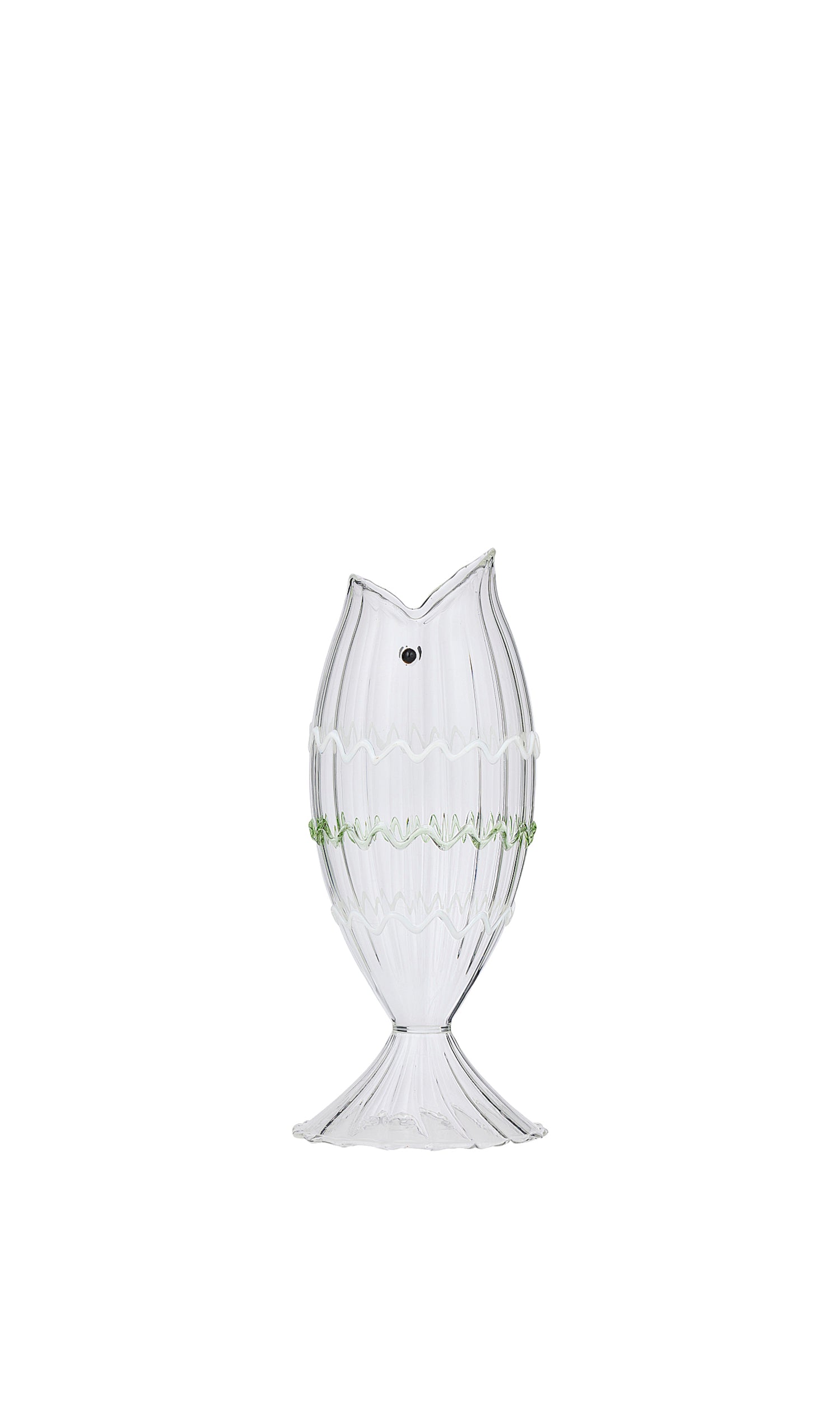 A small clear ribbed glass vase shaped like a fish, with a tail-fin base, a black glass eye and wavy ivory and green trim bands around the body.