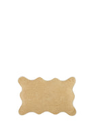 Beige textured rug on a white background with scalloped edge HAUSETTE