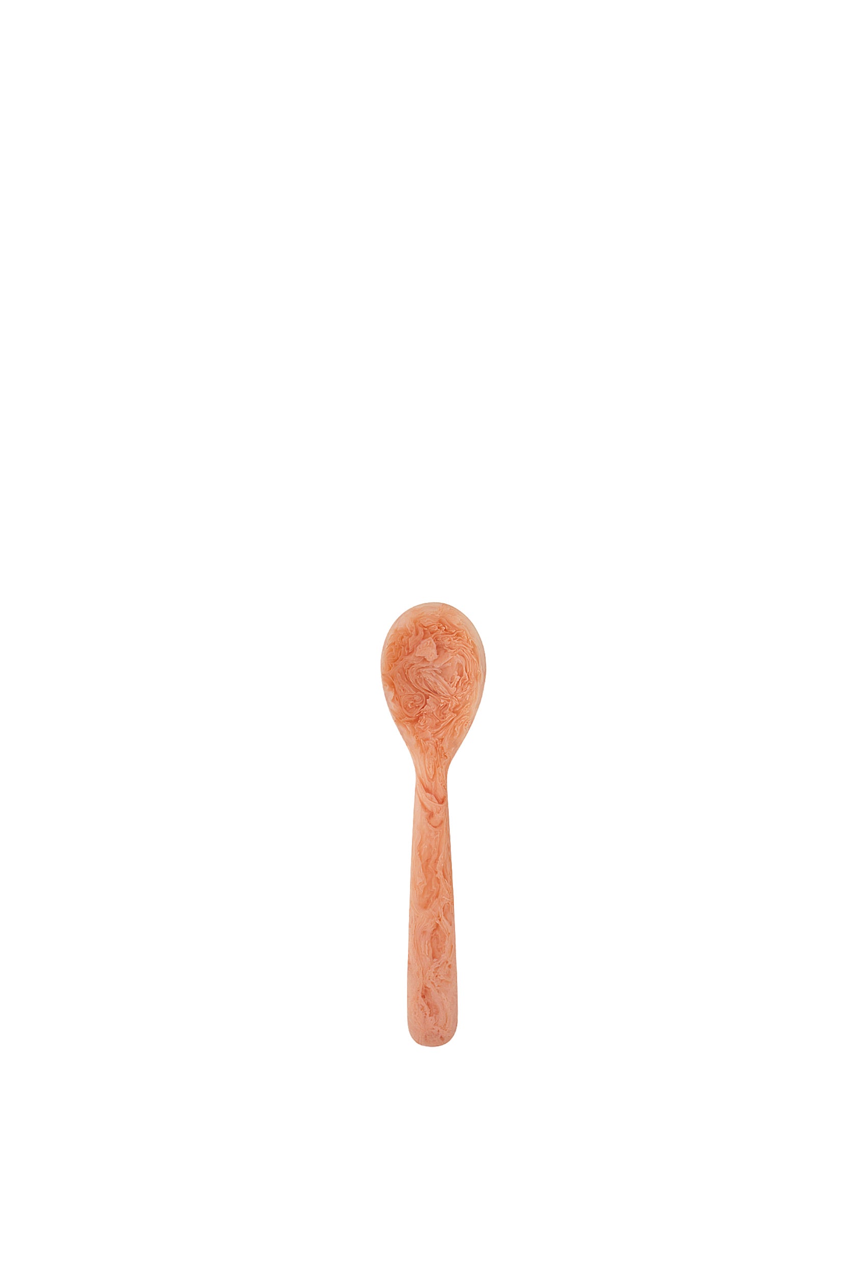 A small peachy orange resin spoon with subtle natural marbling, a rounded bowl and short straight handle.
